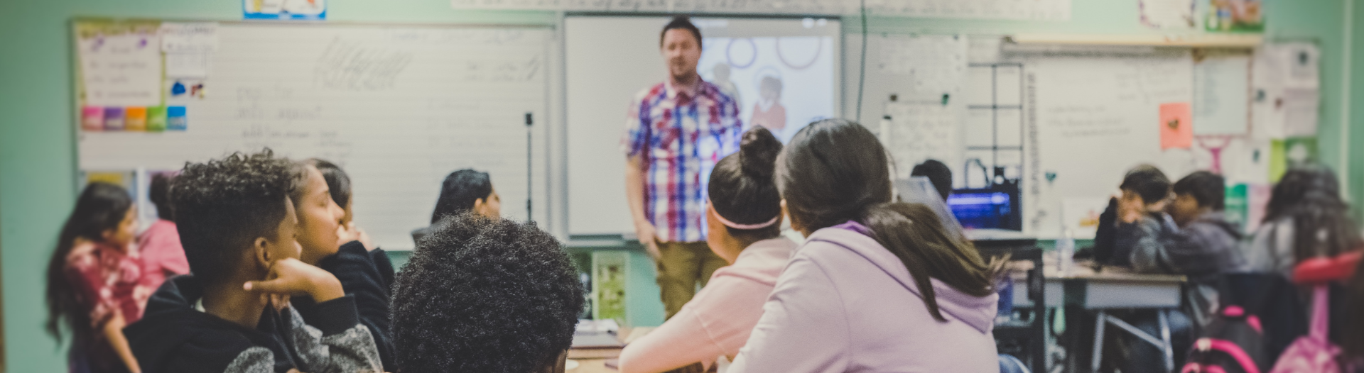 teacher in front of classroom of students